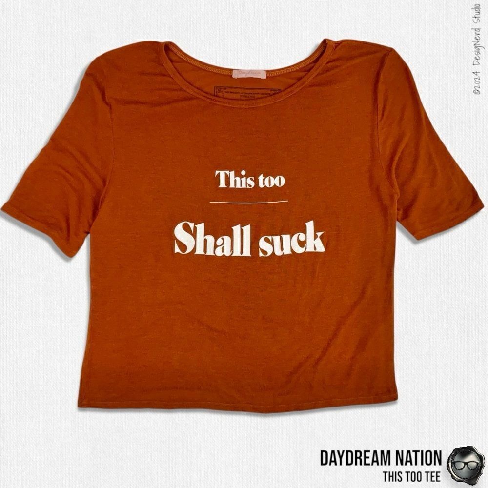 DAYDREAM NATION X DOLLS KILL THIS TOO GRAPHIC TEE SHIRT IN RUSTY BRONZE SIZE S
